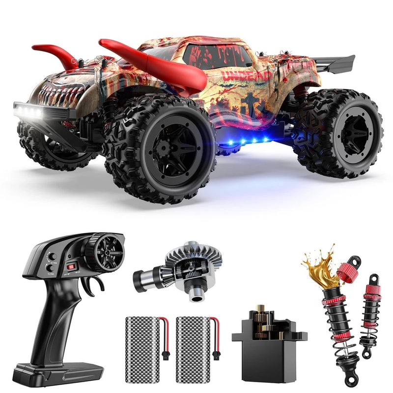 Camouflage 4WD all-terrain RC truck with red fins, blue lights, and shock suspension parts