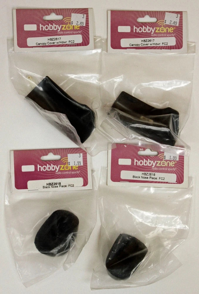 Set of 4 black RC plane canopy covers in sealed plastic bags