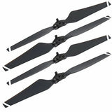 Set of black folding drone propellers with quick-release mounting hubs