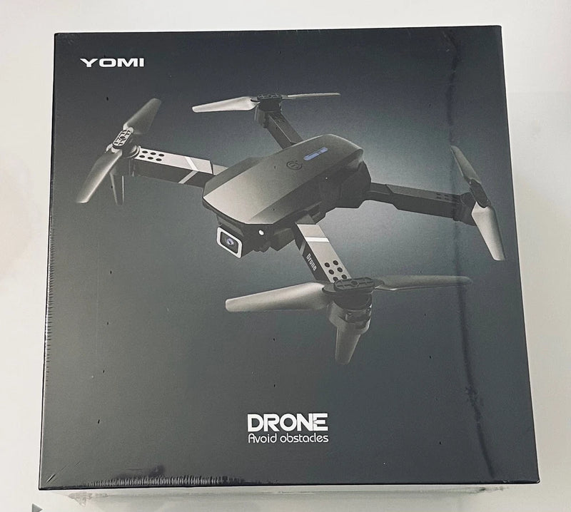 YOMI foldable 4K obstacle-avoidance drone box with quadcopter illustration