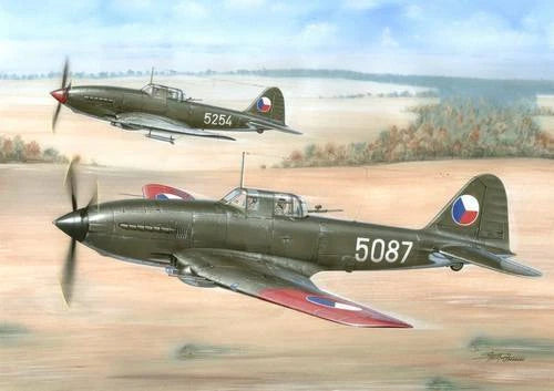 Dark green WWII attack aircraft model with propeller and 5087 markings, roundel decals