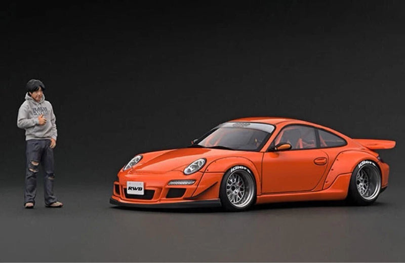 Orange 1/18 scale RWB 997 GT3 race car model with black wheels and front details