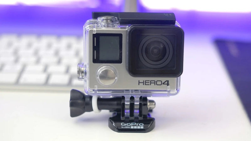 GoPro HERO4 Black Edition action camera with clear waterproof housing and front lens