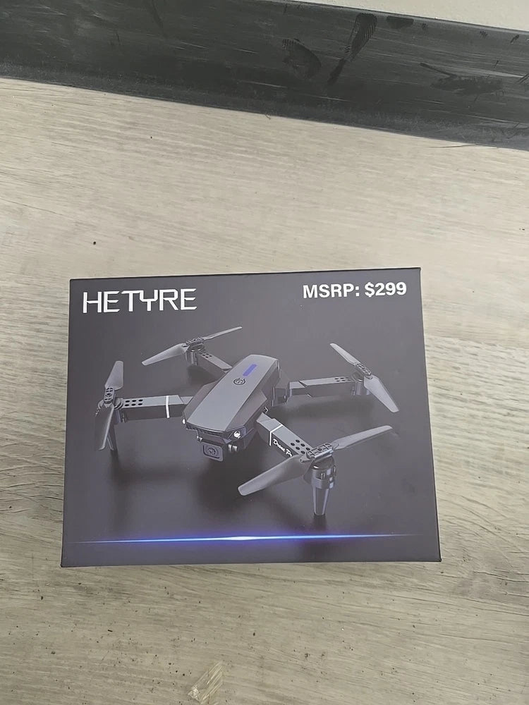 HETYRE drone product box with printed quadcopter and camera on retail packaging