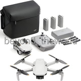 Foldable white quadcopter drone with camera, propellers, and black storage case