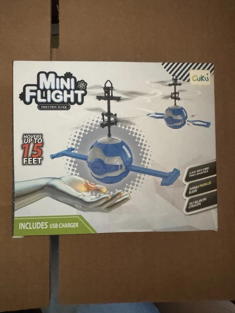 Mini UFO-style drone retail box with illustrated blue hovering drone