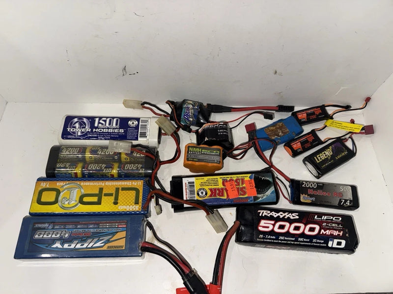 Used Traxxas RC car battery lot with multiple LiPo packs and connected wires