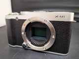 Fujifilm X-M1 Mirrorless Camera with Battery Charger Leather Cover Grip Used