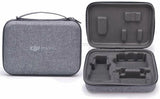 Gray zippered drone carrying case with foam insert and molded compartments