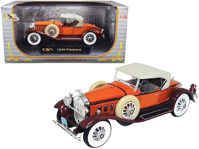 Brown 1930 Packard boattail speedster die-cast model car with white wheels