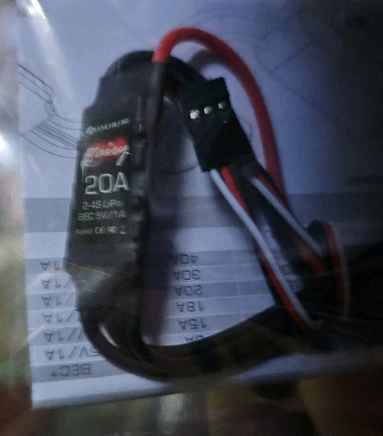 20A brushless ESC speed controller with red and black wiring harness