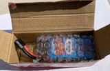RC LiPo battery pack with red and black wires, inside open cardboard box