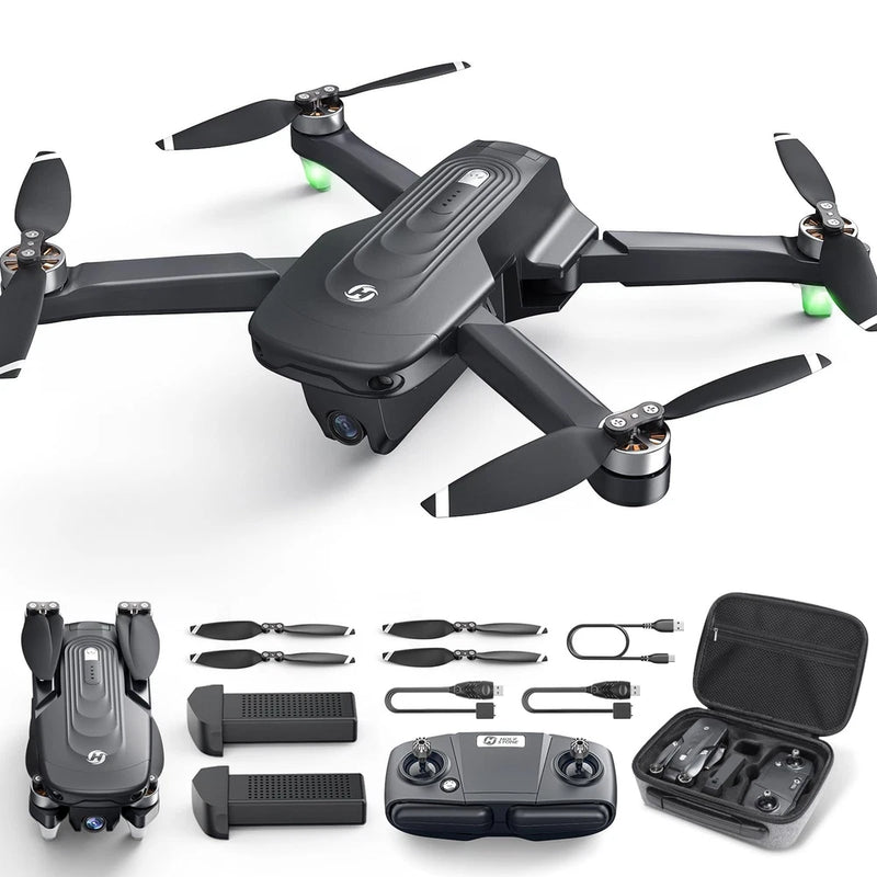 Black quadcopter drone with four propellers, batteries, remote, and carrying case