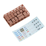 Scale model battery tray with miniature battery parts and printed decoration sticker sheet