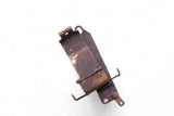 Rusty metal motorcycle battery box bracket with mounting holes and straps