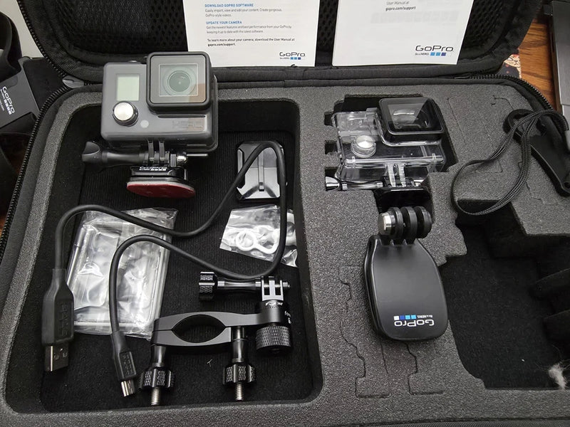 GoPro HERO action camcorder with mounts and accessories in a protective hard case