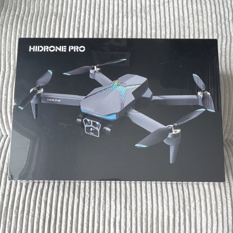 Gray quadcopter drone with camera and four propellers