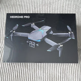 Gray quadcopter drone with camera and four propellers