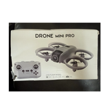 Mini Pro ready-to-fly camera drone box with drone and remote control illustration