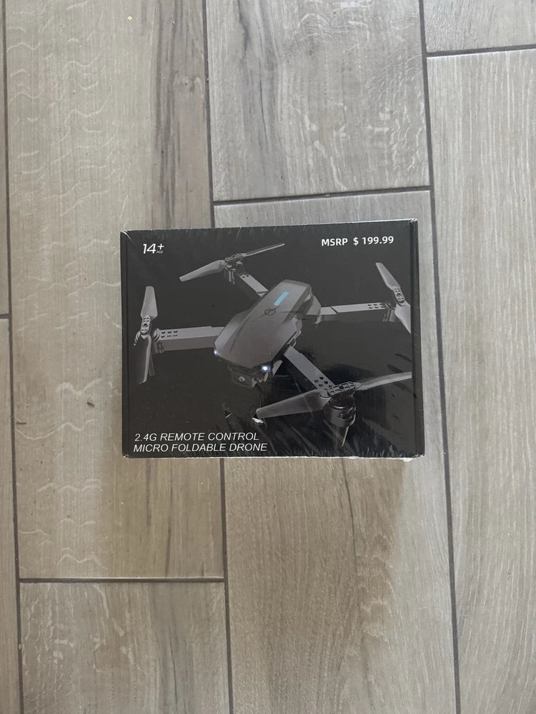 Micro foldable remote control photo drone in retail box