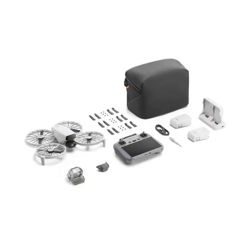 Camera drone fly-more combo kit with gray case, controller, batteries, and propellers