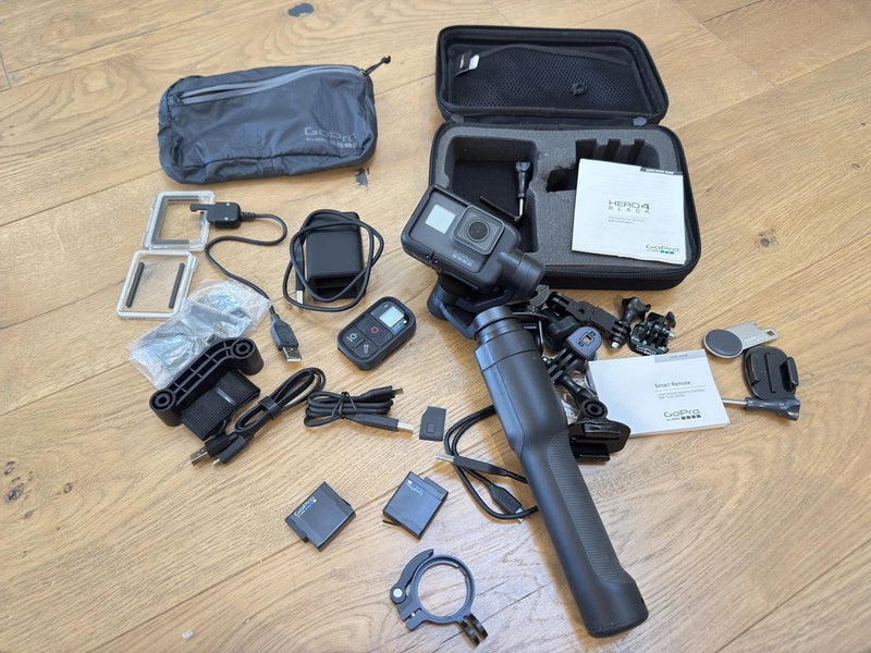 GoPro action camera kit with gimbal handle, protective case, batteries and mounts