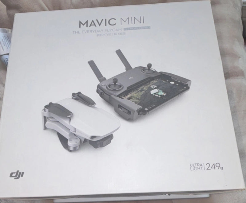 DJI Mavic Mini Fly More kit box with drone and controller