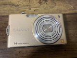 Gold Panasonic LUMIX compact digital camera with lens and 14 megapixels marking