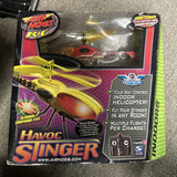 Orange and yellow R/C bug helicopter toy with remote controller in retail package