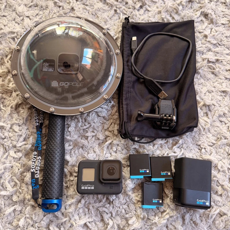 GoPro HERO8 Black action camera with waterproof housing, screen, and included mounts