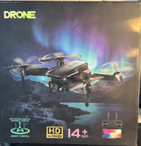 Foldable quadcopter drone with HD camera, dark gray body and four propellers