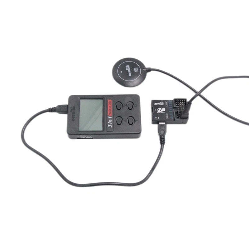 RC flight controller unit with LCD screen, buttons, and connected GPS receiver module