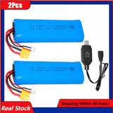 Two blue 20650 rechargeable batteries with red/black leads and charger with XT60 plug