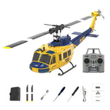 Yellow and blue RC helicopter with remote controller and accessory parts, ready to fly