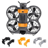 Orange and black drone landing gear bracket with prop guards and mounting parts