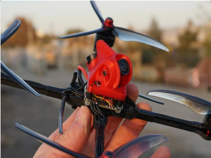 Gatehunter X 3D printed camera canopy in red on an FPV drone camera mount