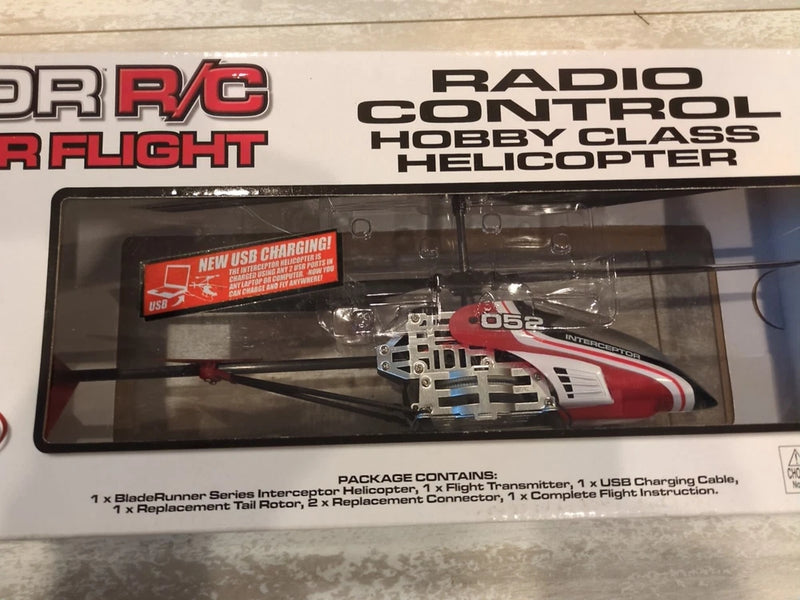 Radio control helicopter model 052 in retail package with red-and-white rotor head