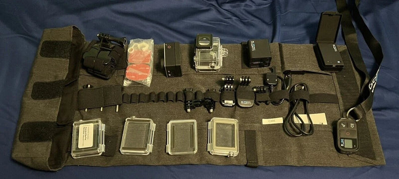 GoPro HERO4 action camera and accessories kit in olive fabric pouch
