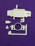 White plastic model car radiator and battery shroud parts, assorted pieces