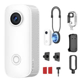 White mini action camera with large lens and included magnetic mount accessories