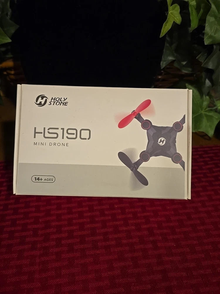 Mini drone box packaging with red propellers, Holy Stone HS190