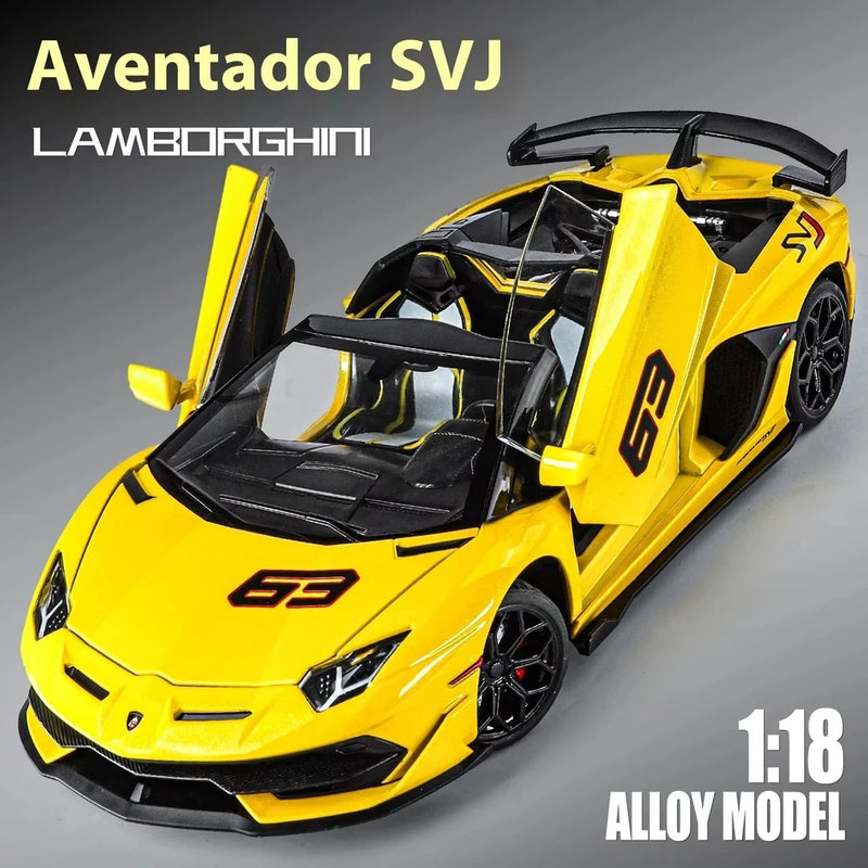 Yellow 1/18 scale supercar model with black wheels, front splitter, and rear spoiler