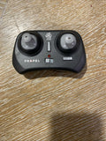 Black drone remote controller with two joysticks, Atom logo, and Propel text
