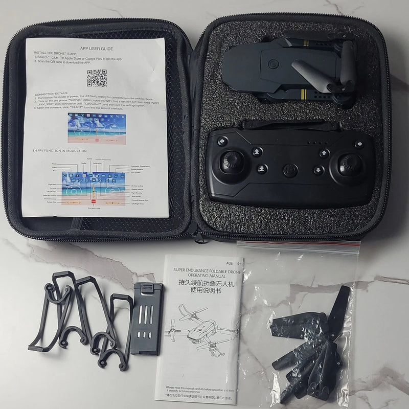 Foldable quadcopter drone kit in hard case with remote controller and accessories