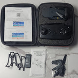 Foldable quadcopter drone kit in hard case with remote controller and accessories