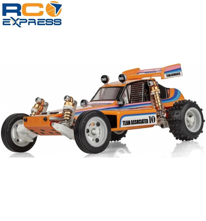 Orange and blue RC model car with white wheels and exposed suspension springs