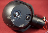 Drone gimbal camera module with black circular housing, front lens, side connector