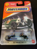 Die-cast 2021 Morgan 3 Wheeler toy car, green body and black wheels, blister pack
