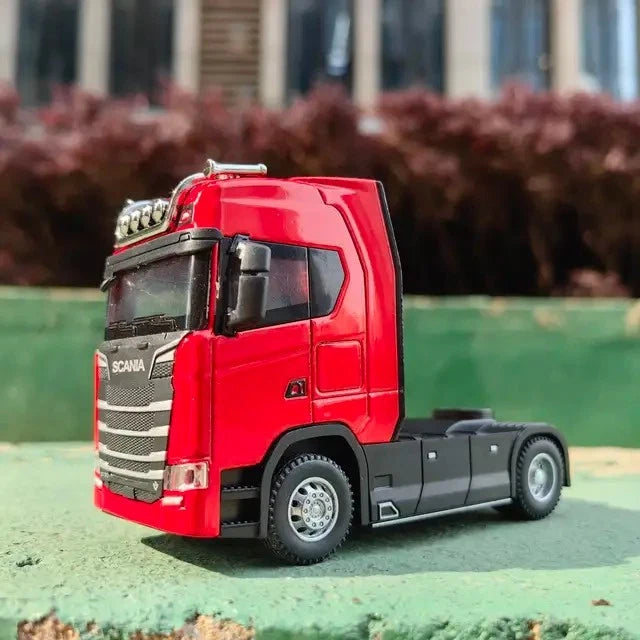 Red die-cast alloy truck toy, tractor cab with grille and chrome details