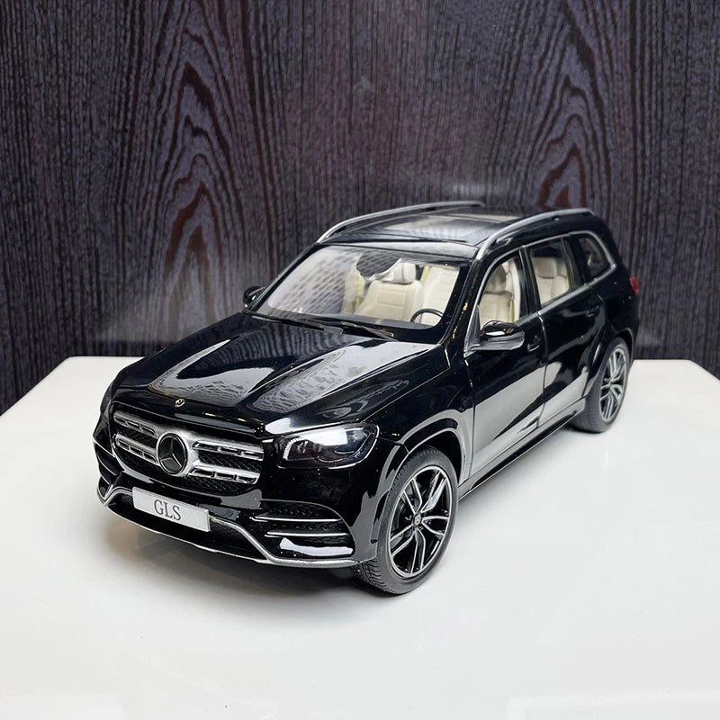 Black Mercedes-Benz SUV model car ornament with chrome grille and alloy wheels